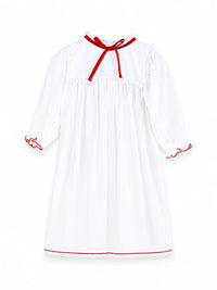 White pima cotton nightgown with red ribbon tie and red trimmed sleeve cuffs, flat lay