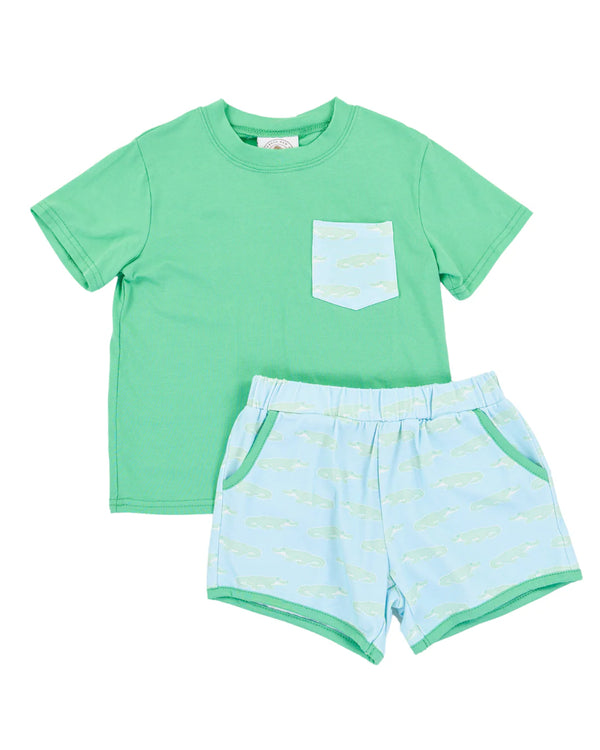 Children's green t-shirt and light blue shorts set on a white background