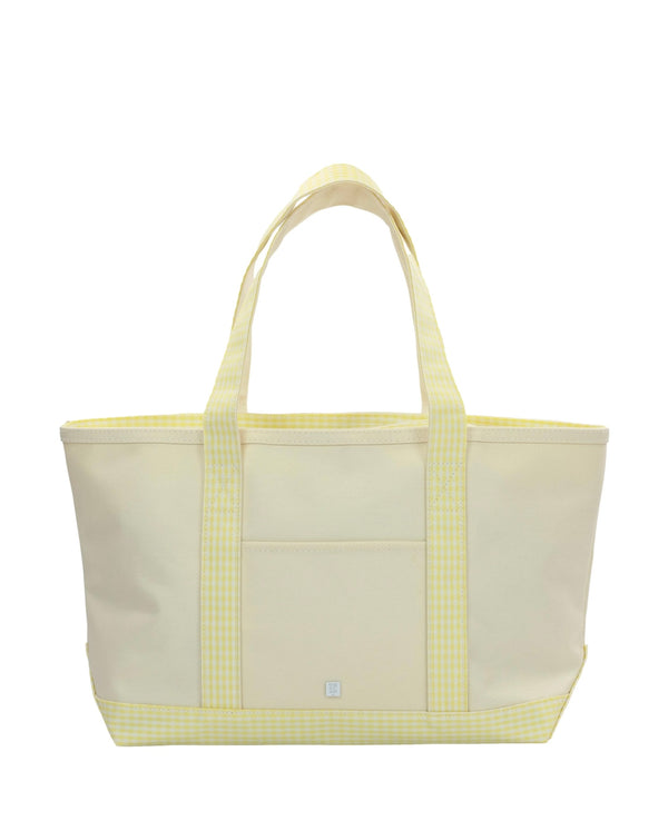 Beige tote bag with yellow accents on a white background