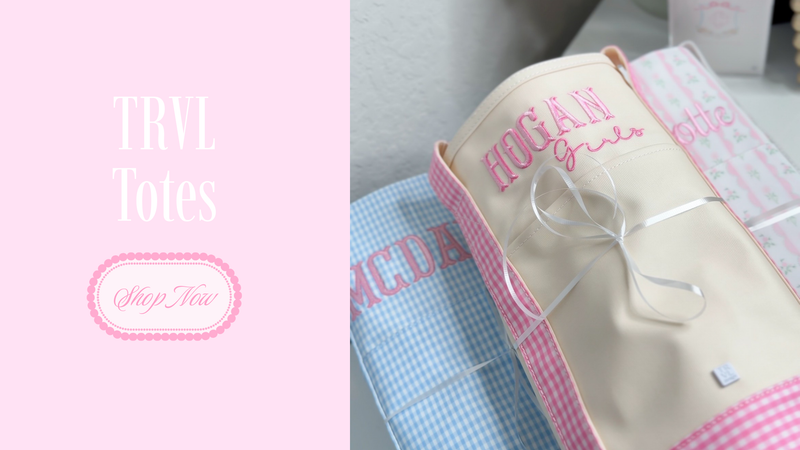 Collection of tote bags with visible branding on a pink background