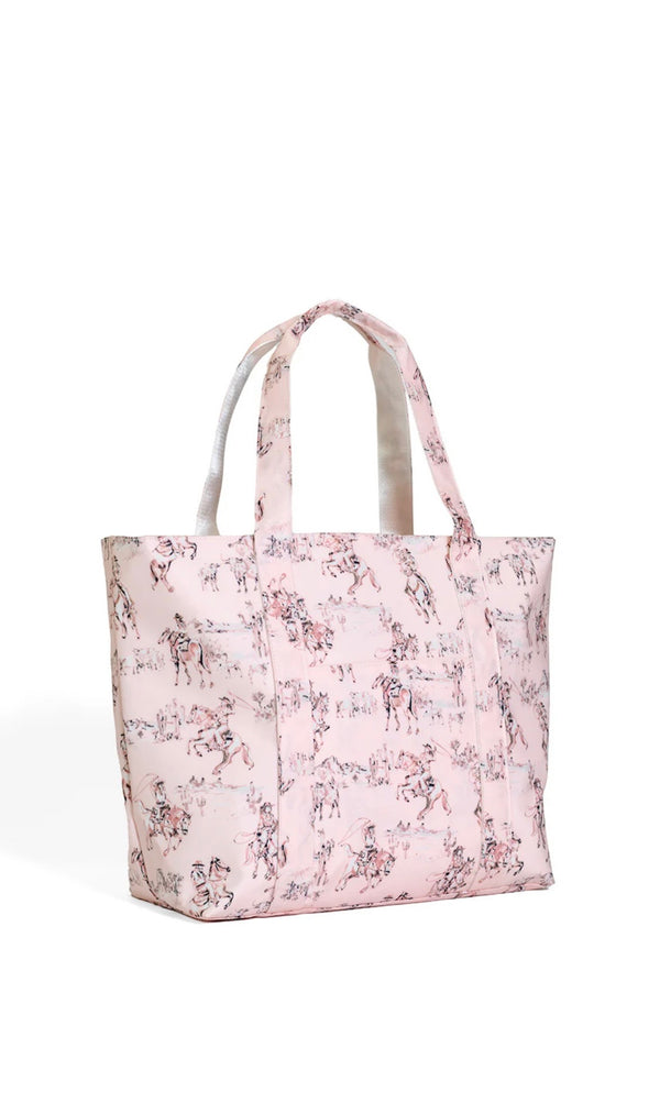 cowboy toile patterned tote bag on a white background