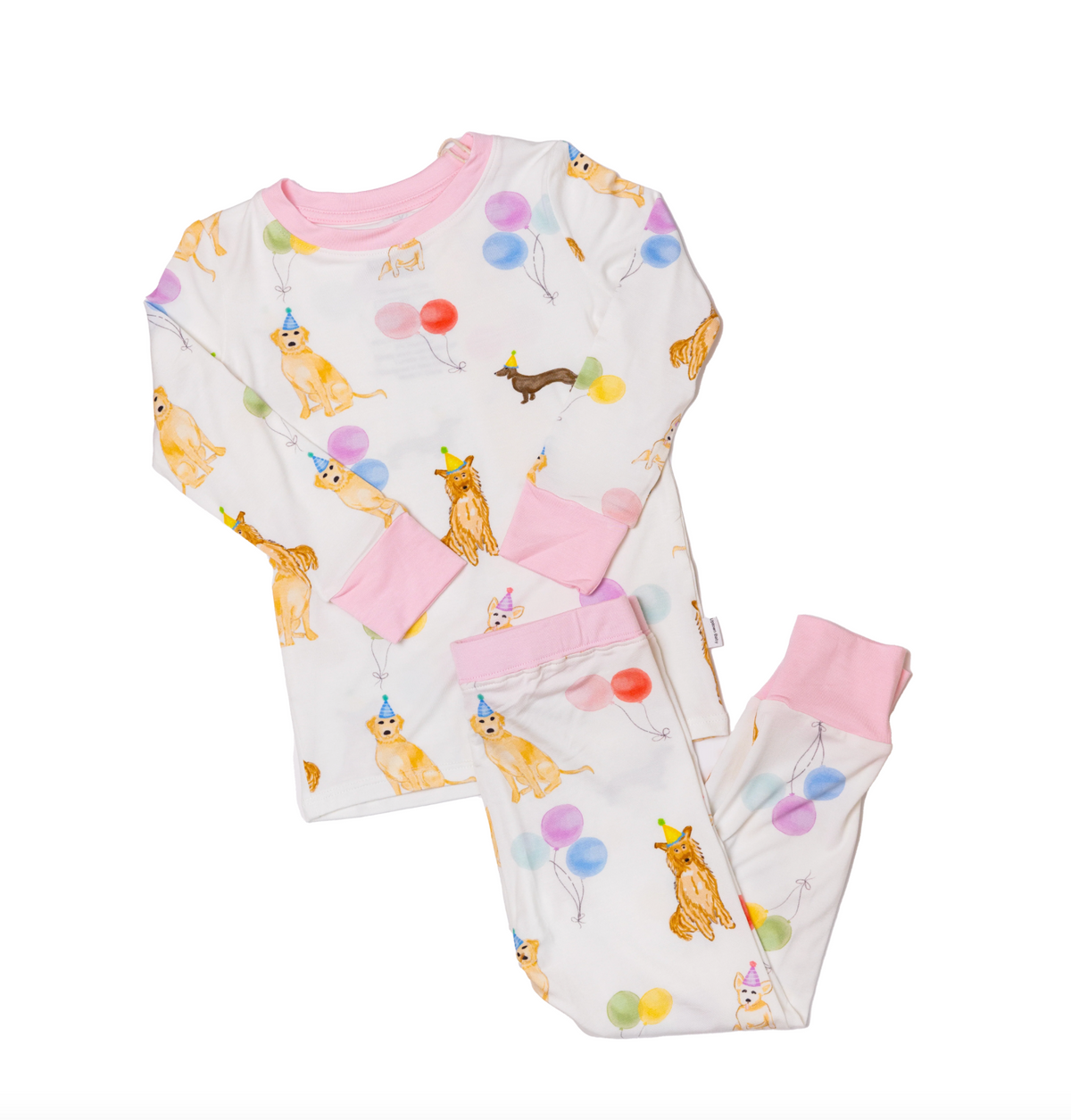 Children's pajama set with dog and balloon pattern on a white background