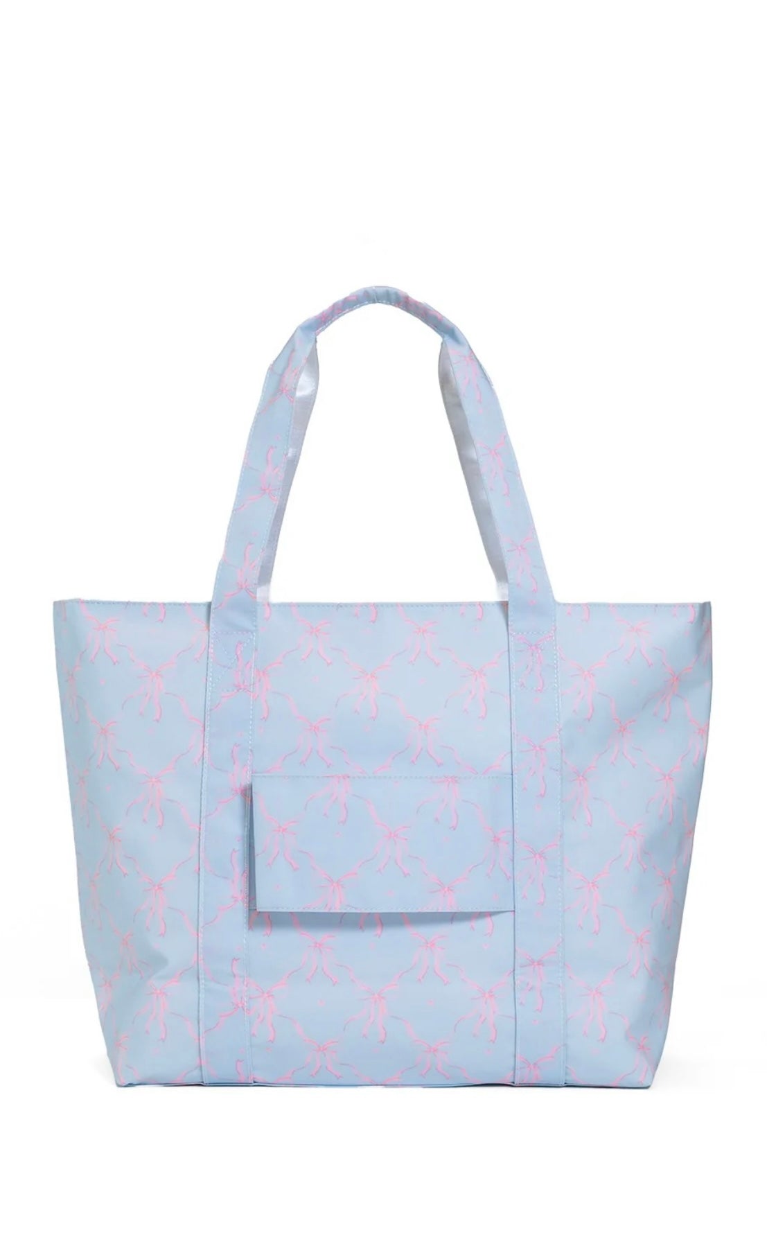 Light blue tote bag with pink bow pattern on a white background