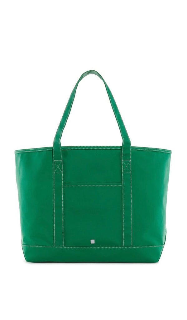 Green trvl maxi tote on white background