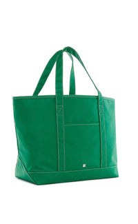 Green trvl maxi tote on white background