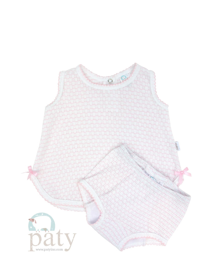 A pink and white knit sleeveless top and matching bloomer set for baby girls by Paty.