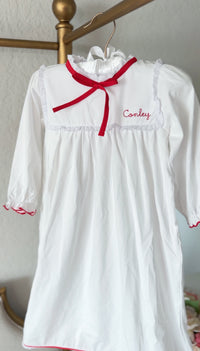 White pima cotton nightgown with lace trim collar and red ribbon bow