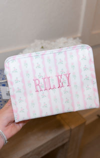 Pink ribbon floral roadie embroidered with the name Riley