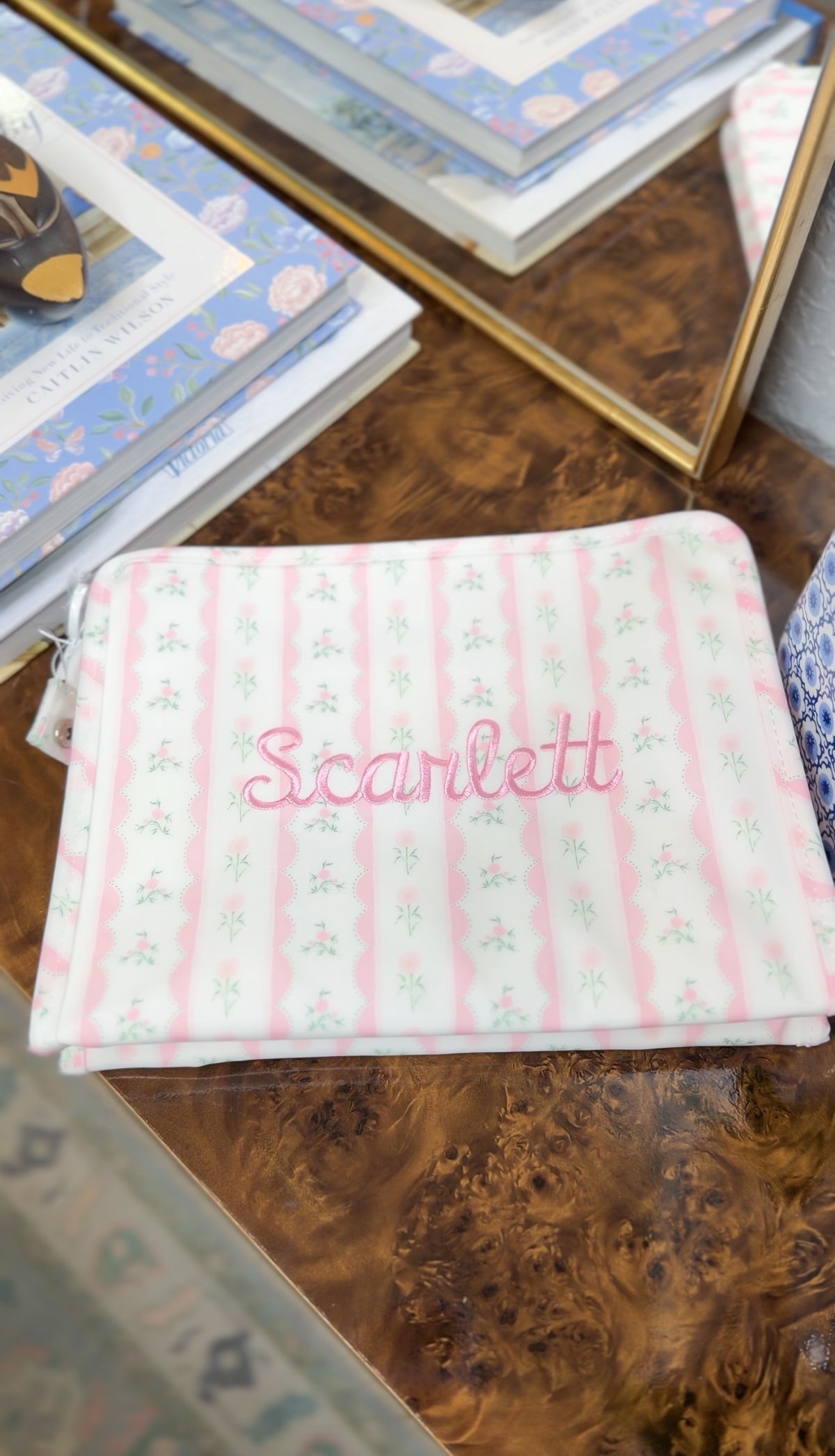 Pink ribbon floral roadie embroidered with the name Scarlett