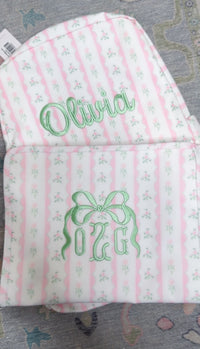 Pink ribbon floral roadie backpack embroidered with the name Olivia and OZG bow monogram