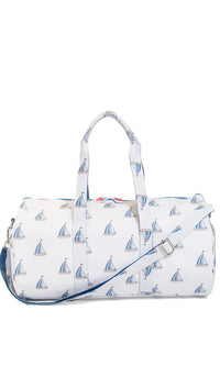 White duffel bag with sailboat pattern on a white background