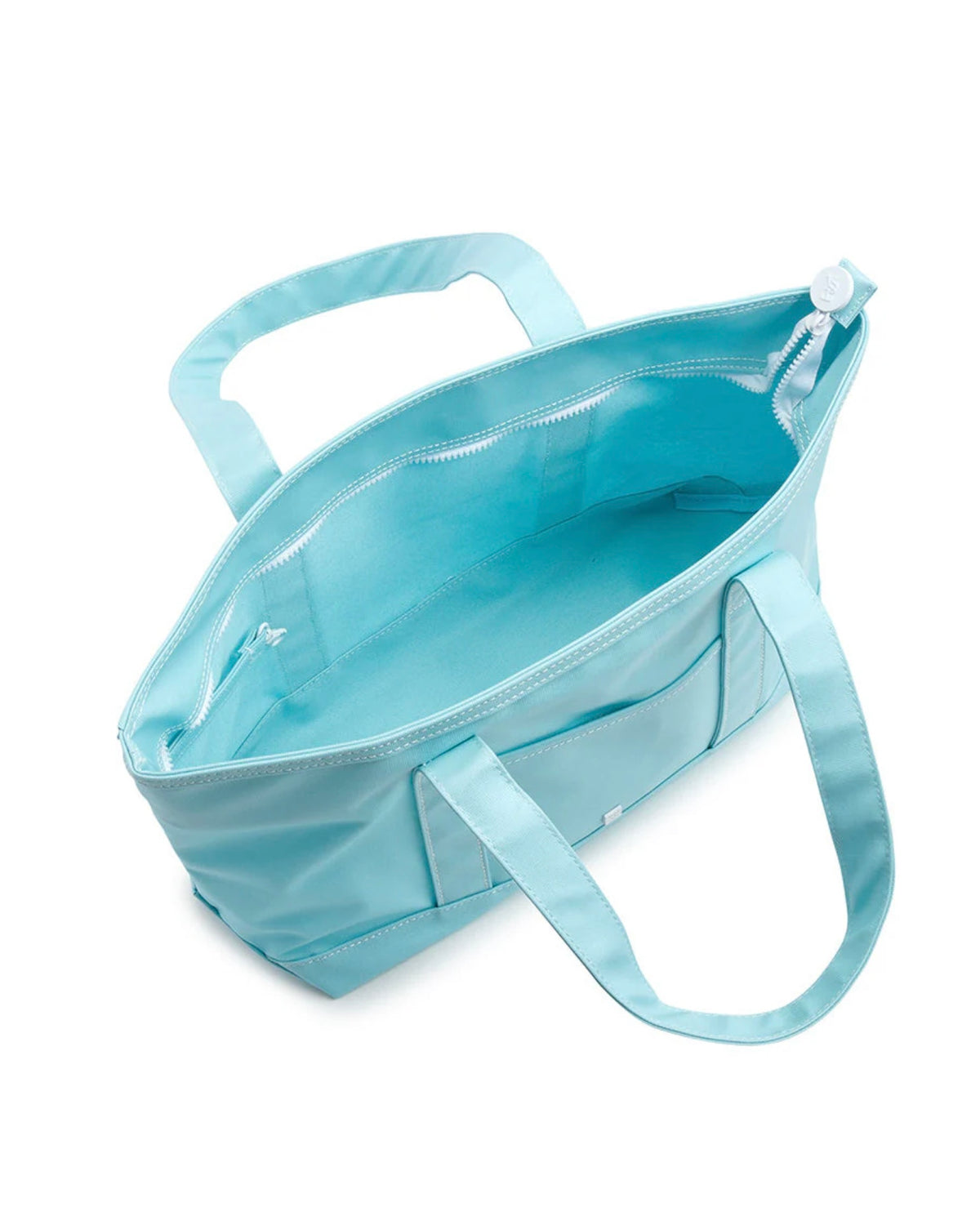 Light blue tote bag with a clear front pocket on a white background