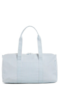 A blue striped duffel bag with handles, depicted against an isolated background.