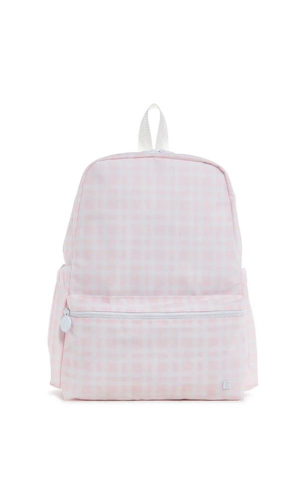 Light pink backpack with a subtle pattern on a white background