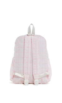 Pink backpack with white straps on a white background