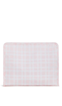 A medium-sized pink plaid travel pouch with a closed zipper.