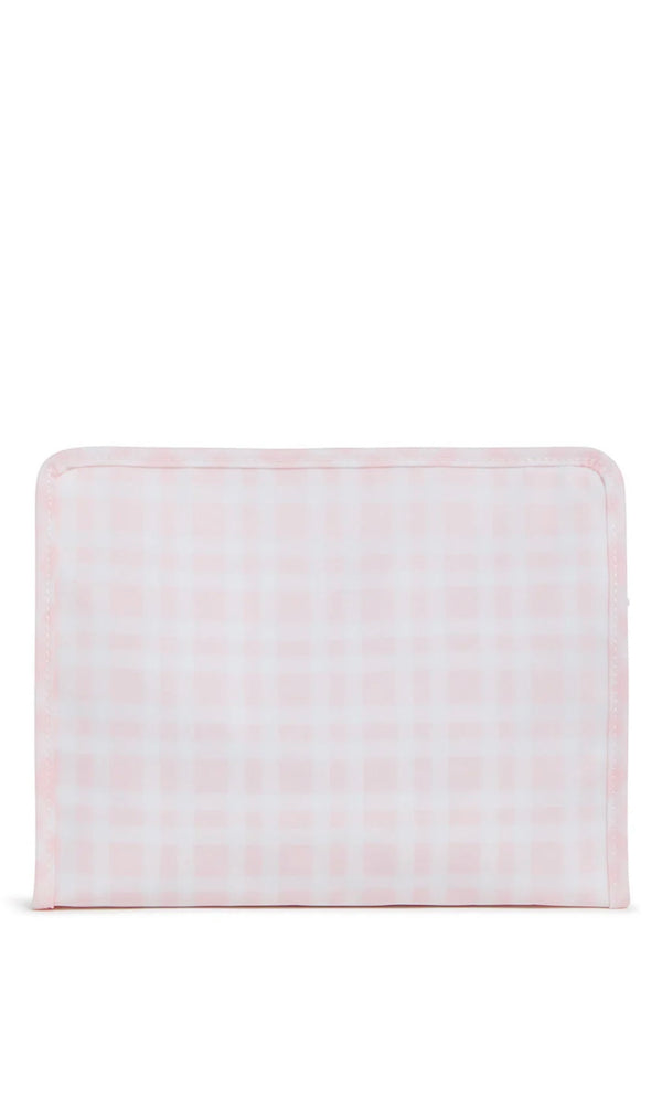 A medium-sized pink plaid travel pouch with a closed zipper.