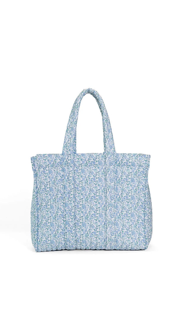 Blue floral tote bag on a white background