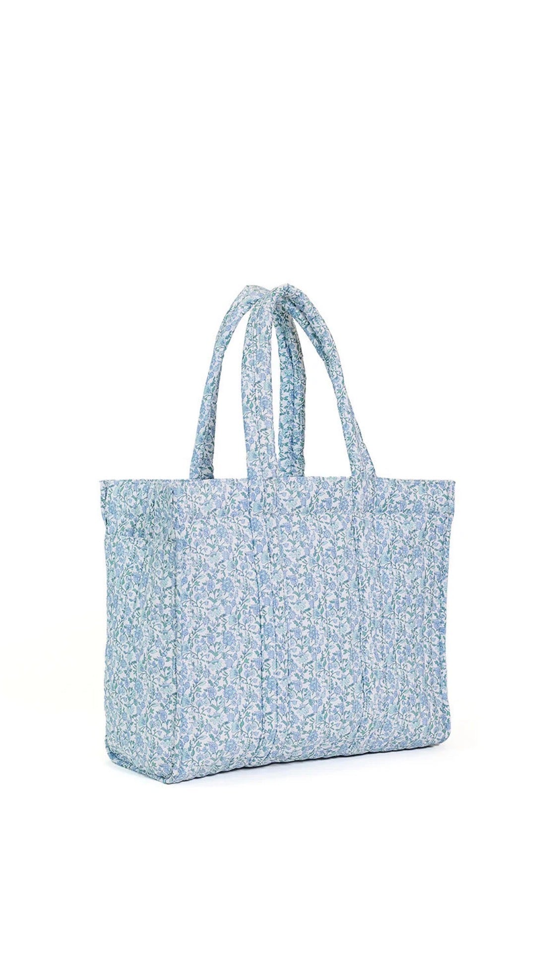 Blue floral tote bag on a white background