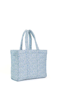 Blue floral tote bag on a white background
