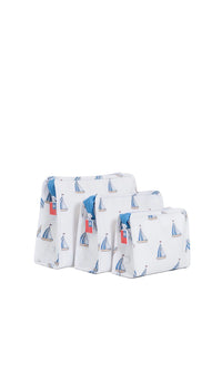 Set of three fabric bags with sailboat pattern on a white background
