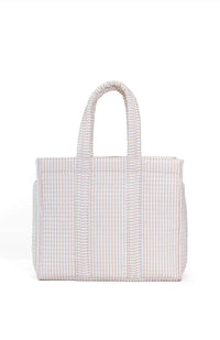 White and sand quilted tote on a white background