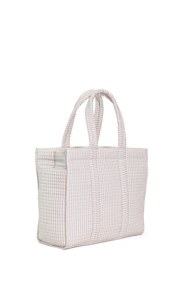White and sand quilted tote on a white background