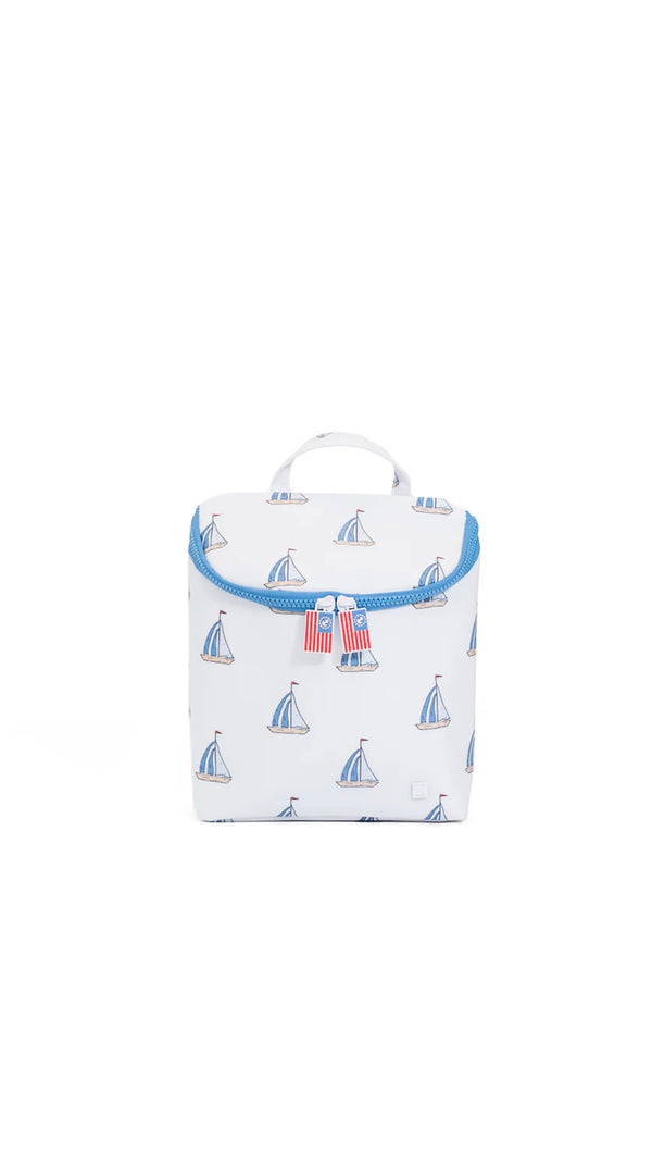 White lunch bag with sailboat pattern on a white background