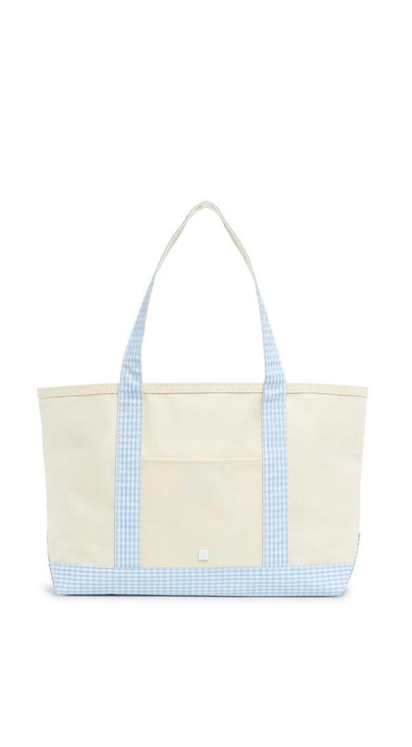 Beige tote bag with blue checkered trim on a white background