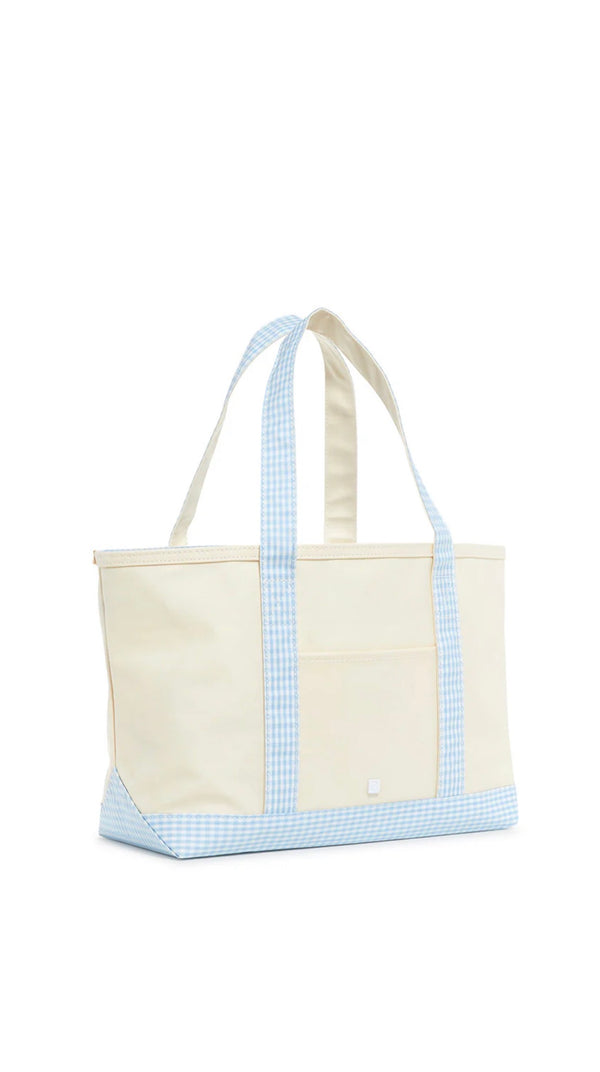 Beige tote bag with blue checkered trim on a white background