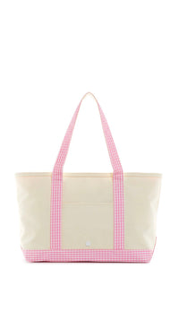Beige tote bag with pink gingham trim on a white background