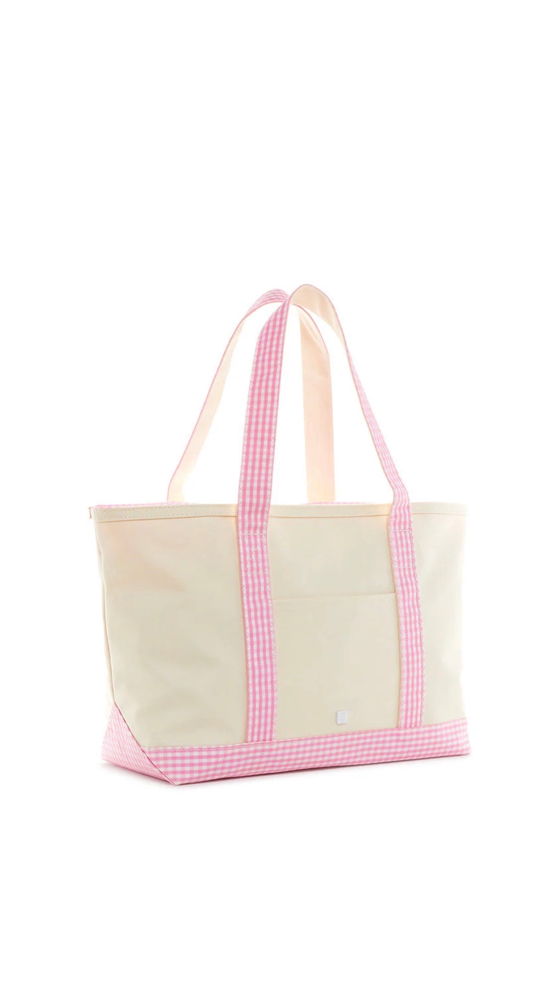 Beige tote bag with pink gingham trim on a white background