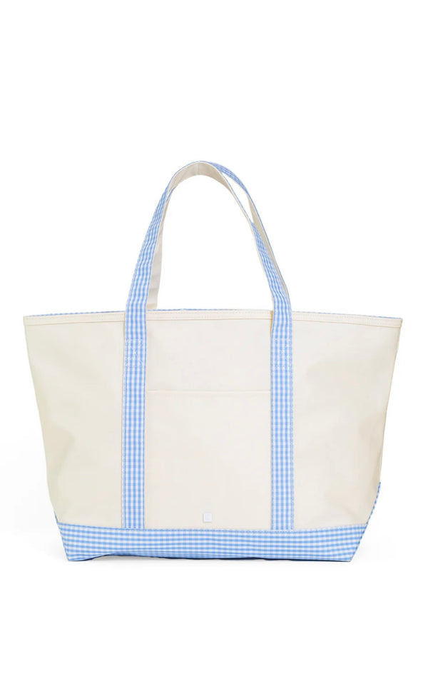 A large canvas tote bag with blue gingham trim on the handles and bottom, with a white background.