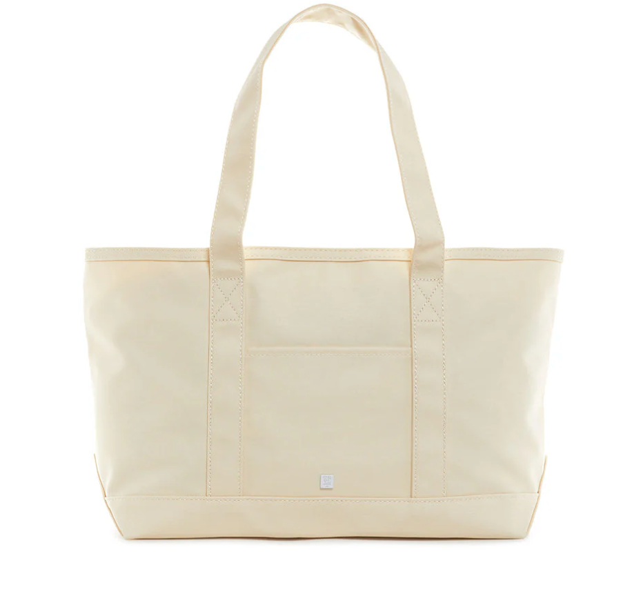 Trvl medium tote in natural on a white background