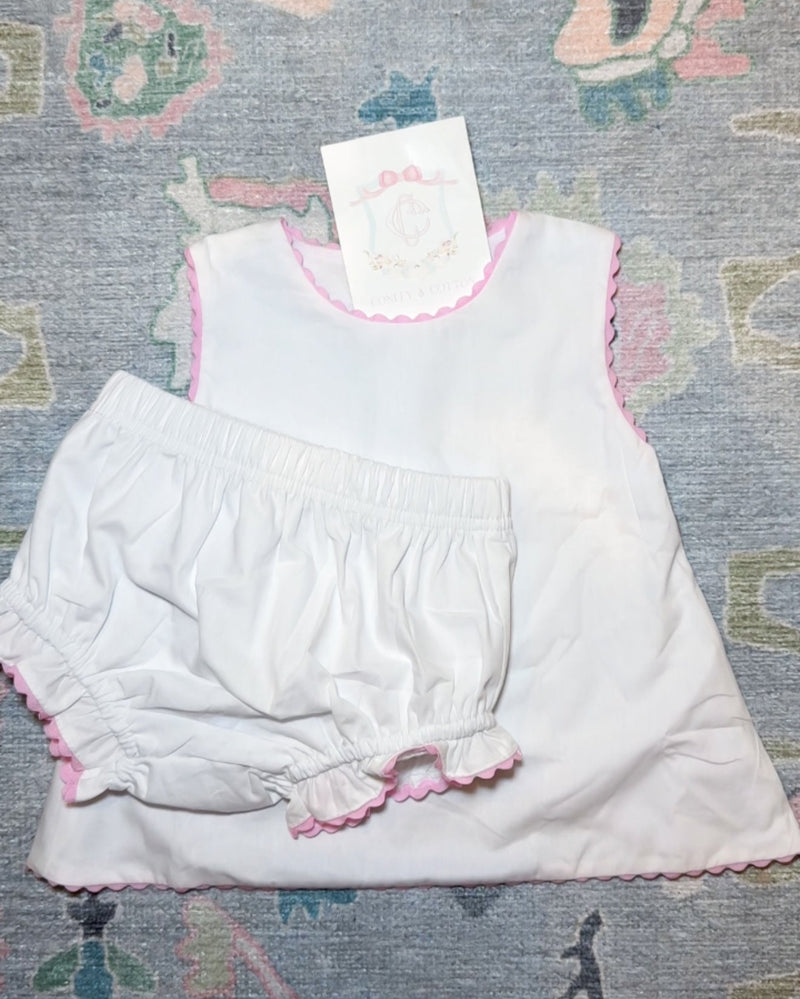 White diaper set with pink ricrac trim