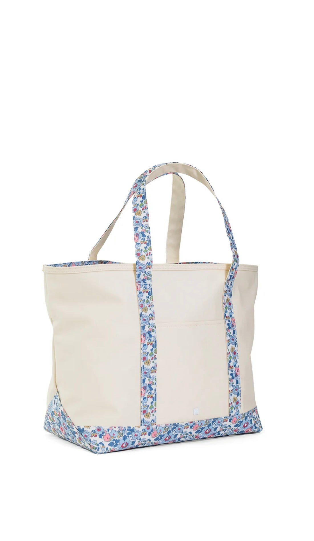 Beige tote bag with floral trim on a white background