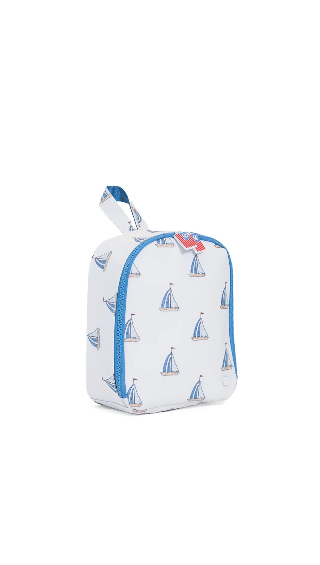Small lunchbox with sailboat pattern on a white background