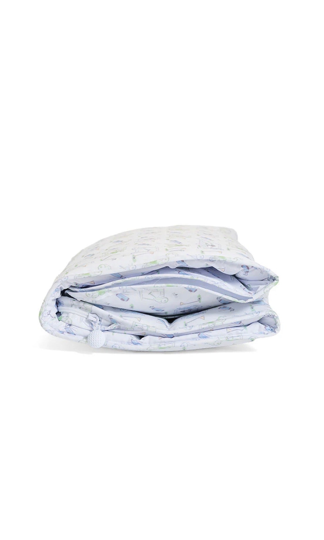 Folded nap mat with golf pattern on a white background