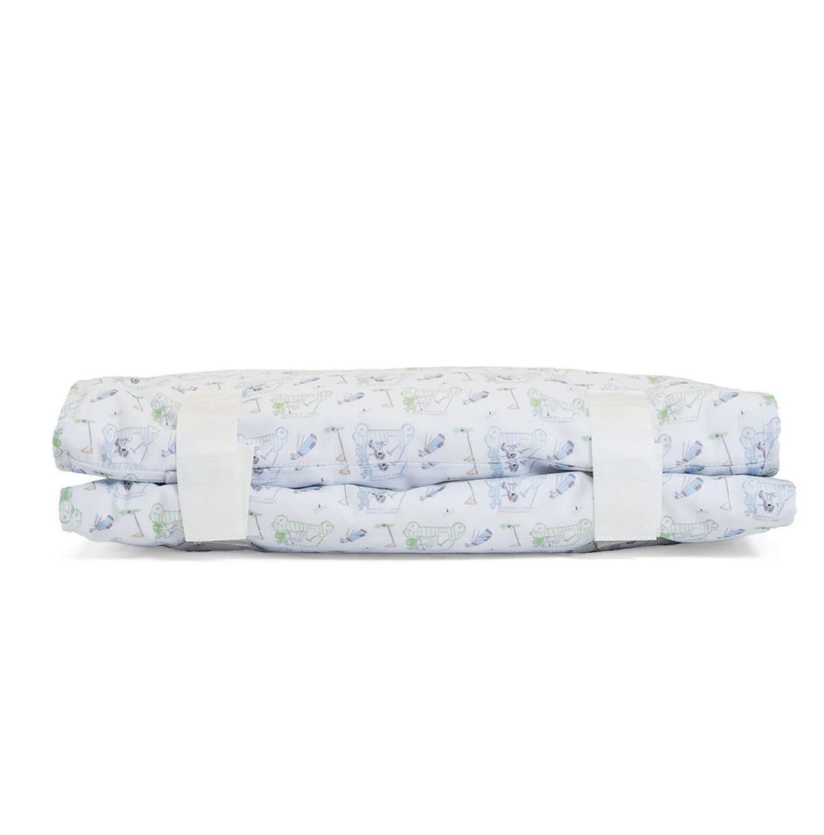 Folded nap mat with golf pattern on a white background