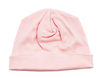 A light pink knit beanie hat with a folded cuff, shown against a plain white background.
