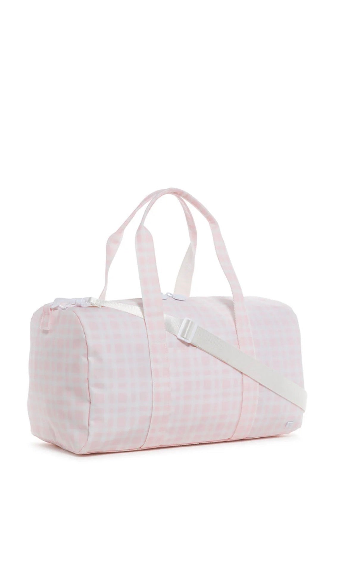 White duffel bag with a subtle plaid pattern on a white background