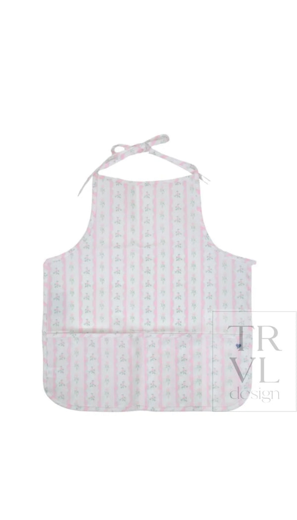 Pink ribbon floral print kids apron with front pocket, back view showing ties