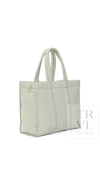Sage green and white quilted Pimlico stripe TRVL Go Go Tote, side angle view showing exterior pocket