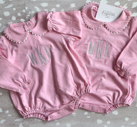 Pink scalloped long sleeve bubble romper for baby, ready for monogramming