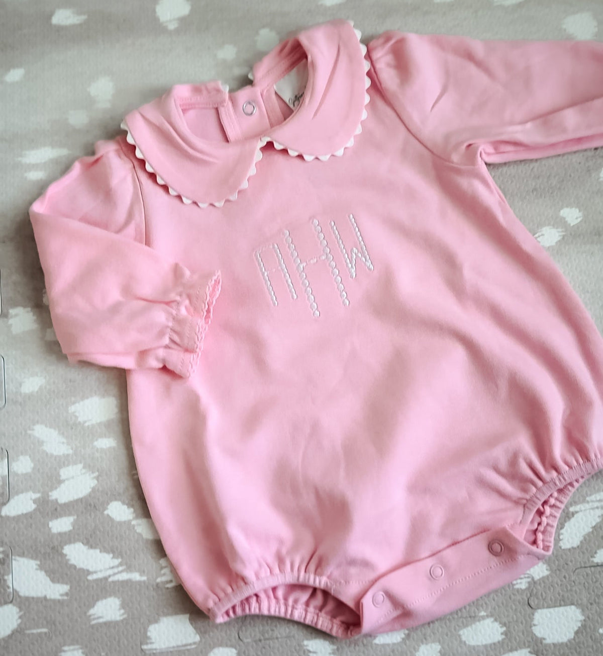 Pink scalloped long sleeve bubble romper for baby, ready for monogramming
