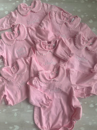 Pink scalloped long sleeve bubble romper for baby, ready for monogramming
