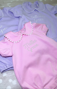 Pink short sleeve scalloped collared bubble romper for baby, ready for monogramming