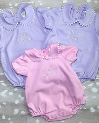 Pink short sleeve scalloped collared bubble romper for baby, ready for monogramming