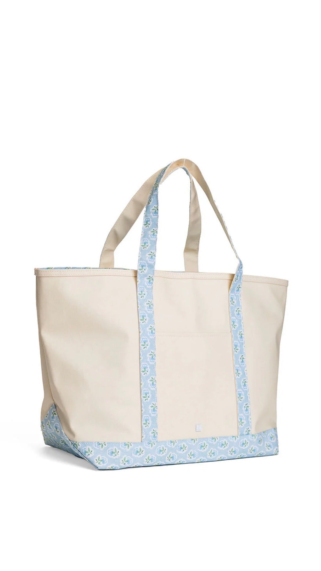 Natural coated canvas TRVL maxi tote with blue petite fleur floral trim