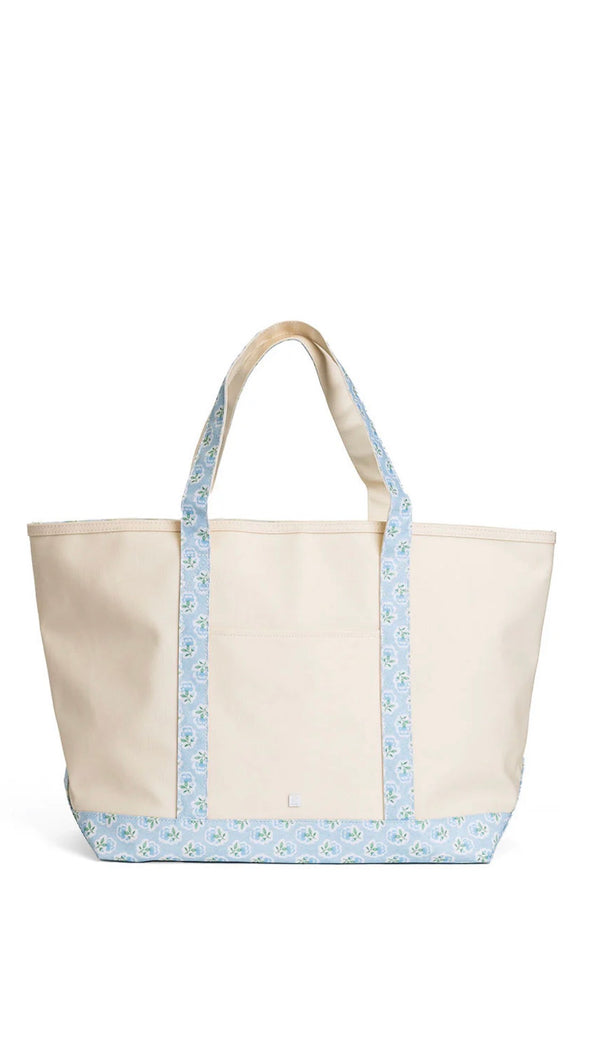Natural coated canvas TRVL maxi tote with blue petite fleur floral trim